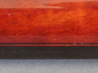 Laminations Under the Fingerboard